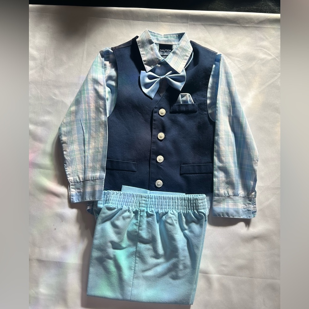 Nautica 4 piece suit.  Shirt, tie, vest and pants.  Size 4